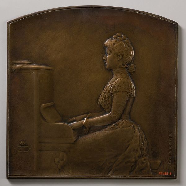 Mlle. C. at the Piano - bronze wall sculpture by Victor David Brenner